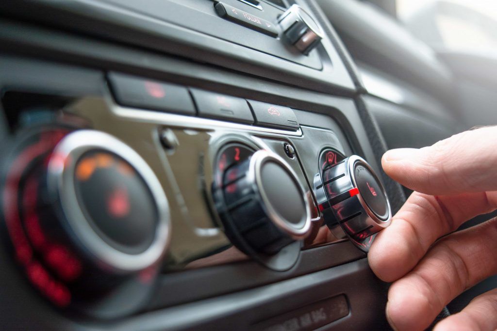 button-for-heating-the-car-seats-close-up-2021-09-04-09-30-01-utc-min-1024x683.jpg