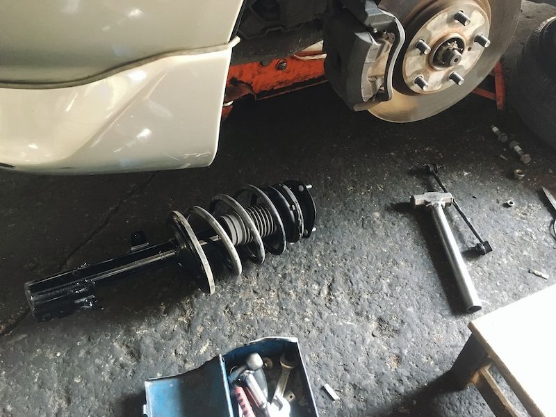 car-suspension-shock-absorber-and-coil-spring.jpg
