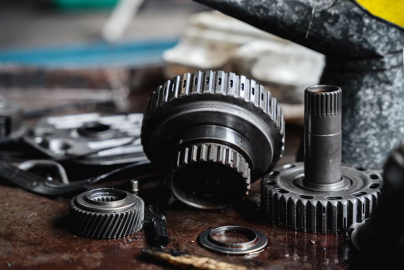 close-up-mechanical-parts-of-car-in-the-garage.jpg