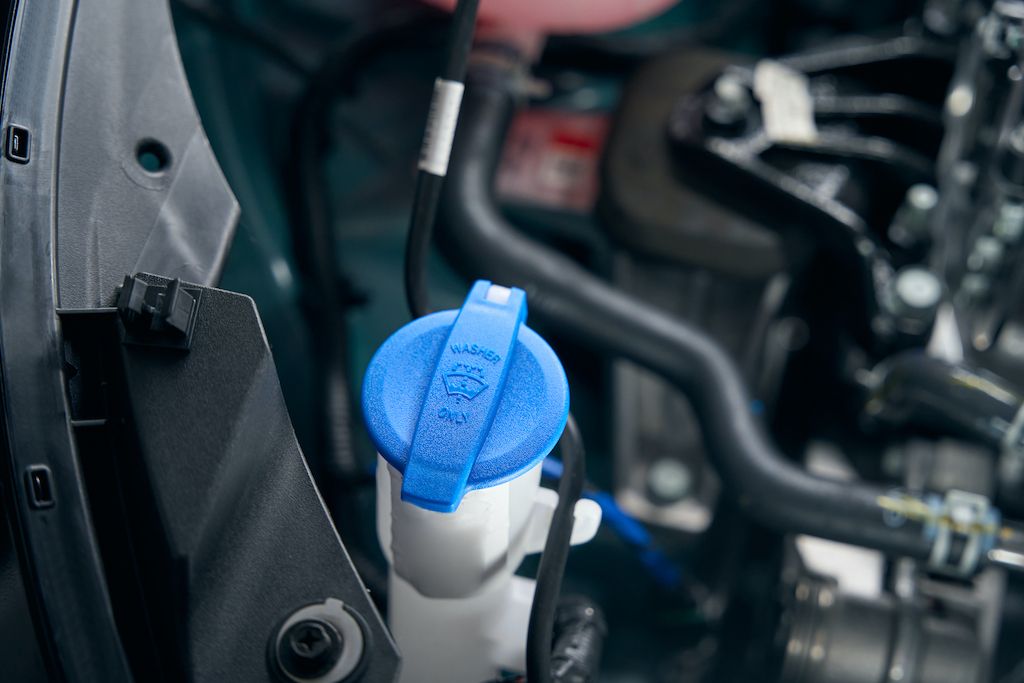 details-of-the-automobile-under-open-hood.jpg