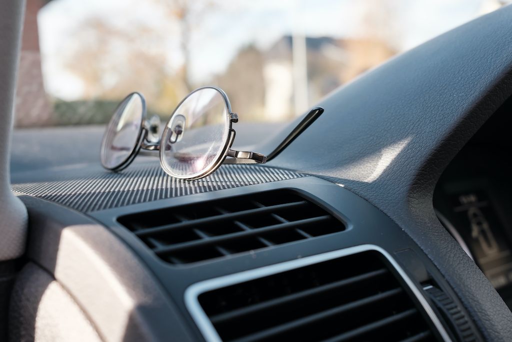 glasses-on-the-dashboard-of-a-car-accessory.jpg