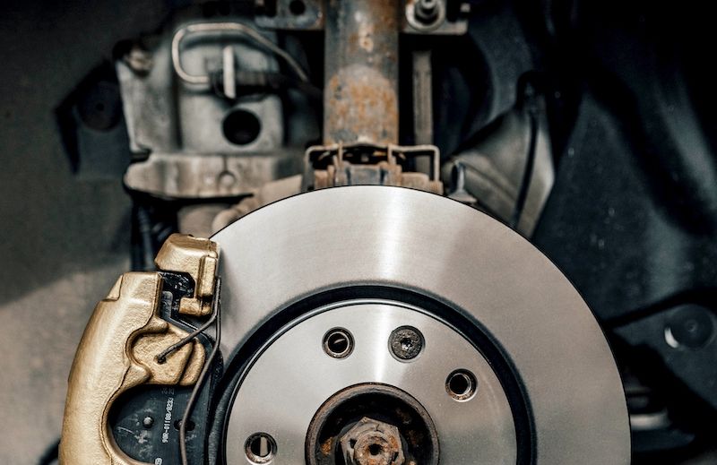 image-of-gold-painted-brake-caliper-on-wheel.jpg