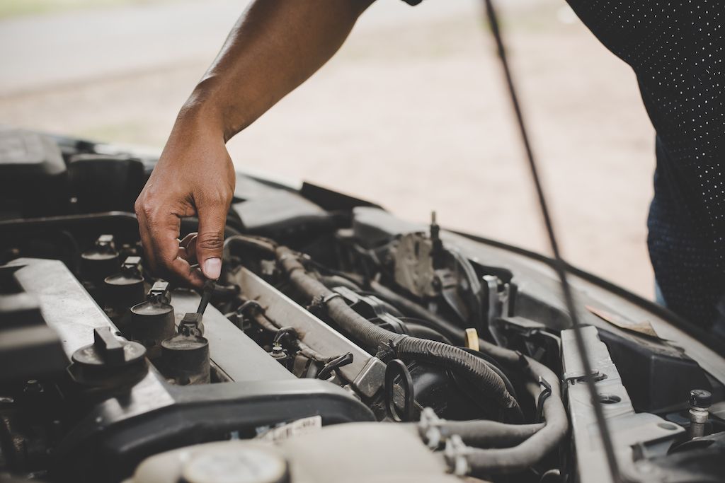 man-checking-car-engine.jpg