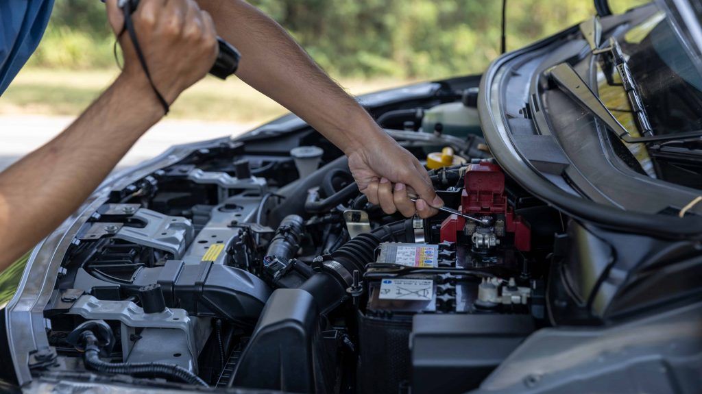 man-is-checking-car-battery-1024x575.jpg