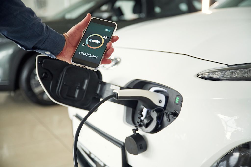 man-with-electrical-car.jpg
