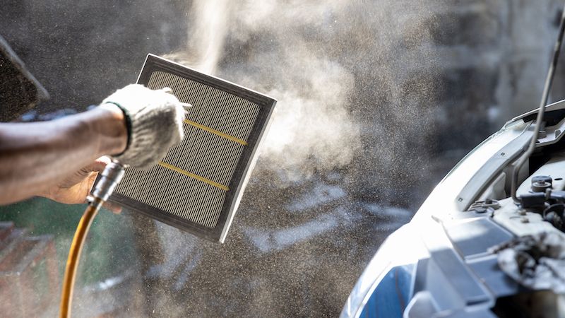 mechanic-cleaning-dirty-car-air-filter.jpg