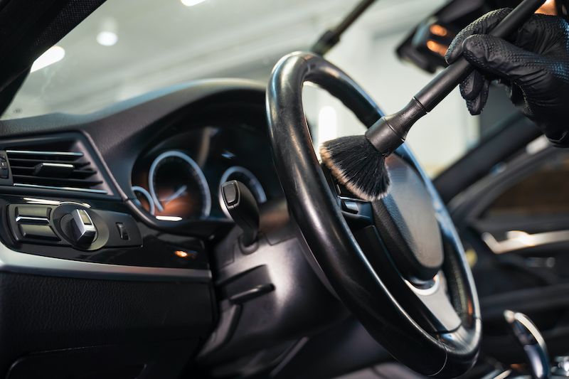 professional-car-cleaning-cleaning-the-steering-wheel.jpg