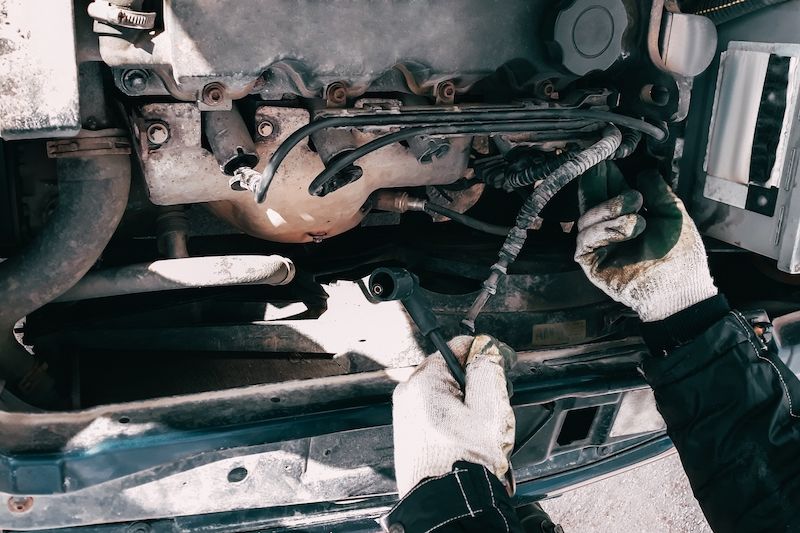 replacing-high-voltage-wires-on-car-engine.jpg