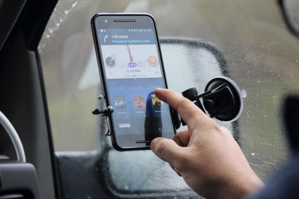 using-mobile-on-the-go-while-driving.jpg