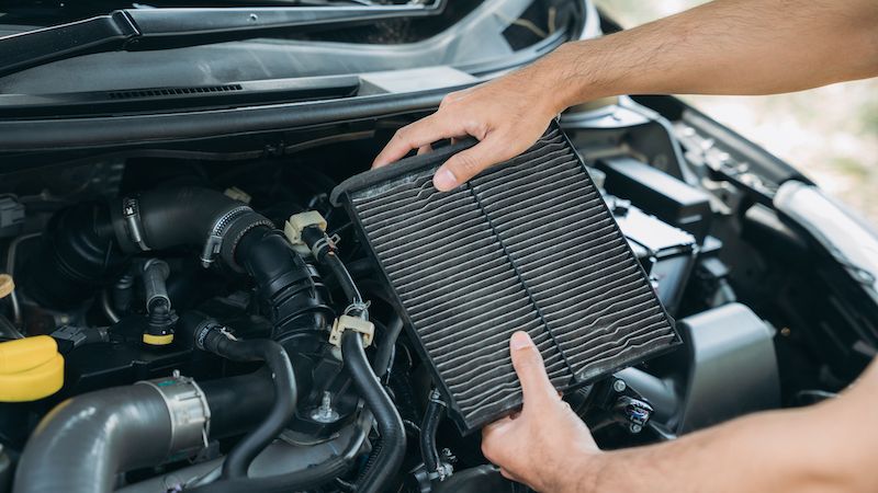 young-man-checking-and-maintenance-air-filter.jpg